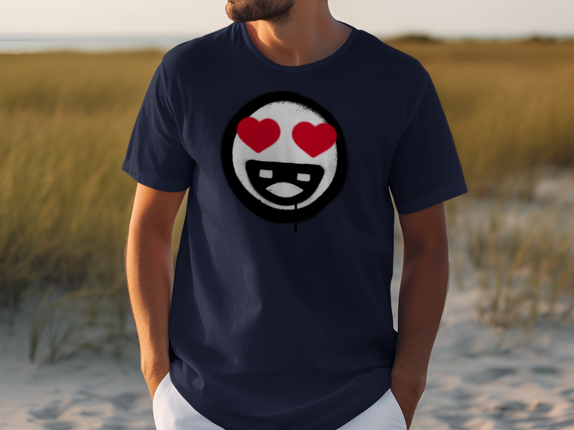 Navy t-shirt with a white circle graphic featuring two red hearts and a smiling mouth.