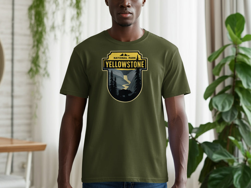 Green t-shirt with Yellowstone National Park graphic featuring a bear and landscape.