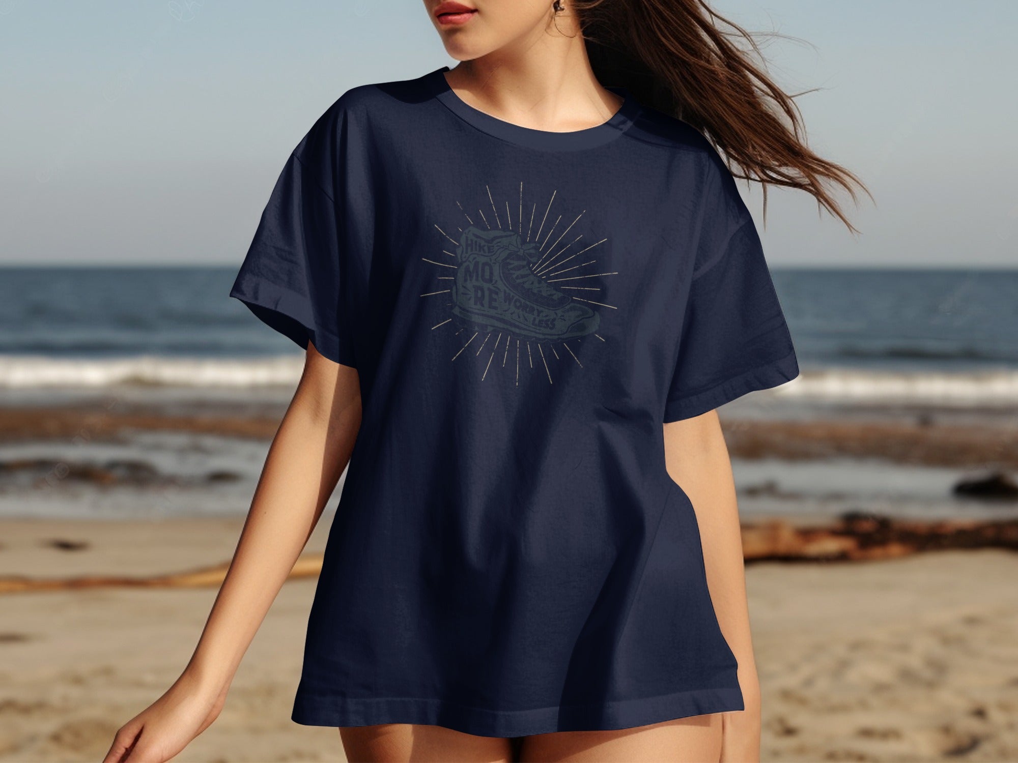 Navy t-shirt featuring a hiking boot graphic with text "Hike More Worry Less".