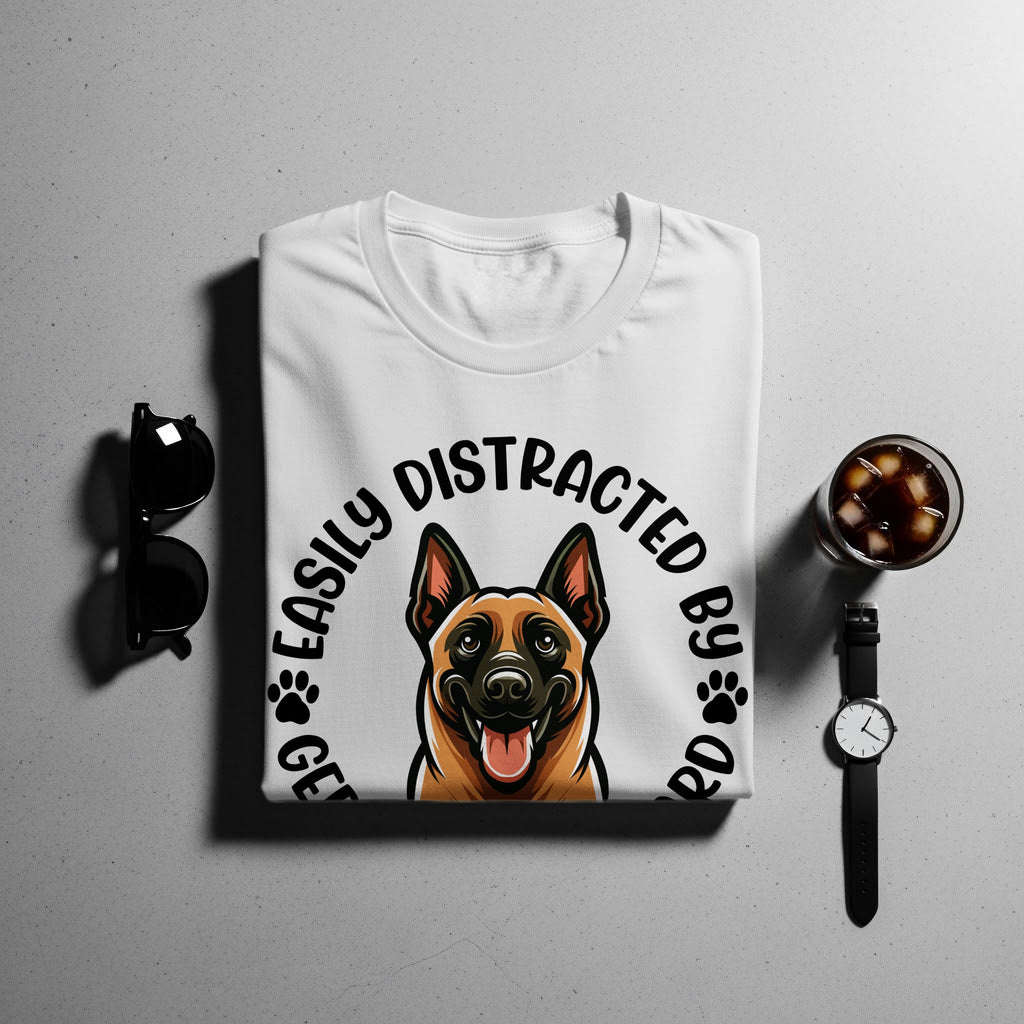 White t-shirt with a dog graphic and text "Easily Distracted By Dogs".