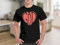 Black t-shirt with a coral heart graphic containing the word "GOD".