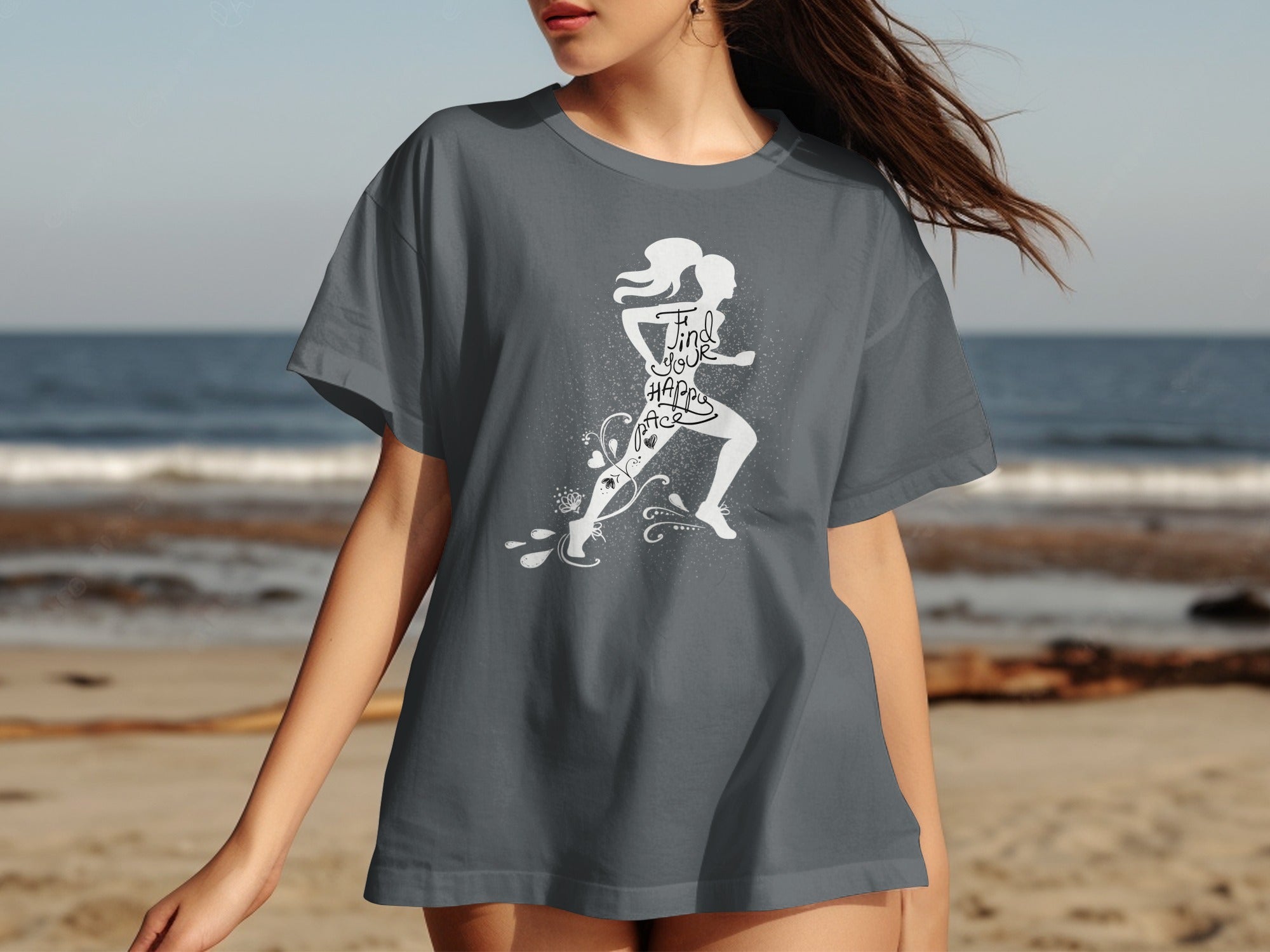Gray t-shirt with a white graphic of a running woman and the words "Find Your Happy Place".