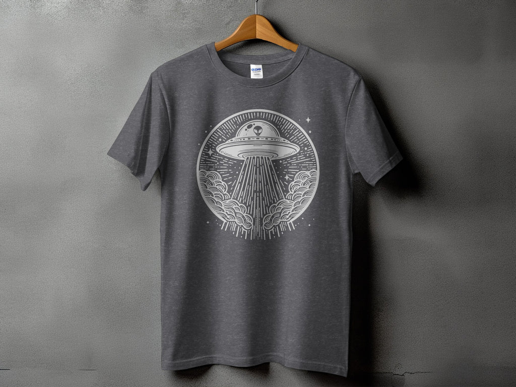 Gray t-shirt with circular alien spaceship and beam graphic design.