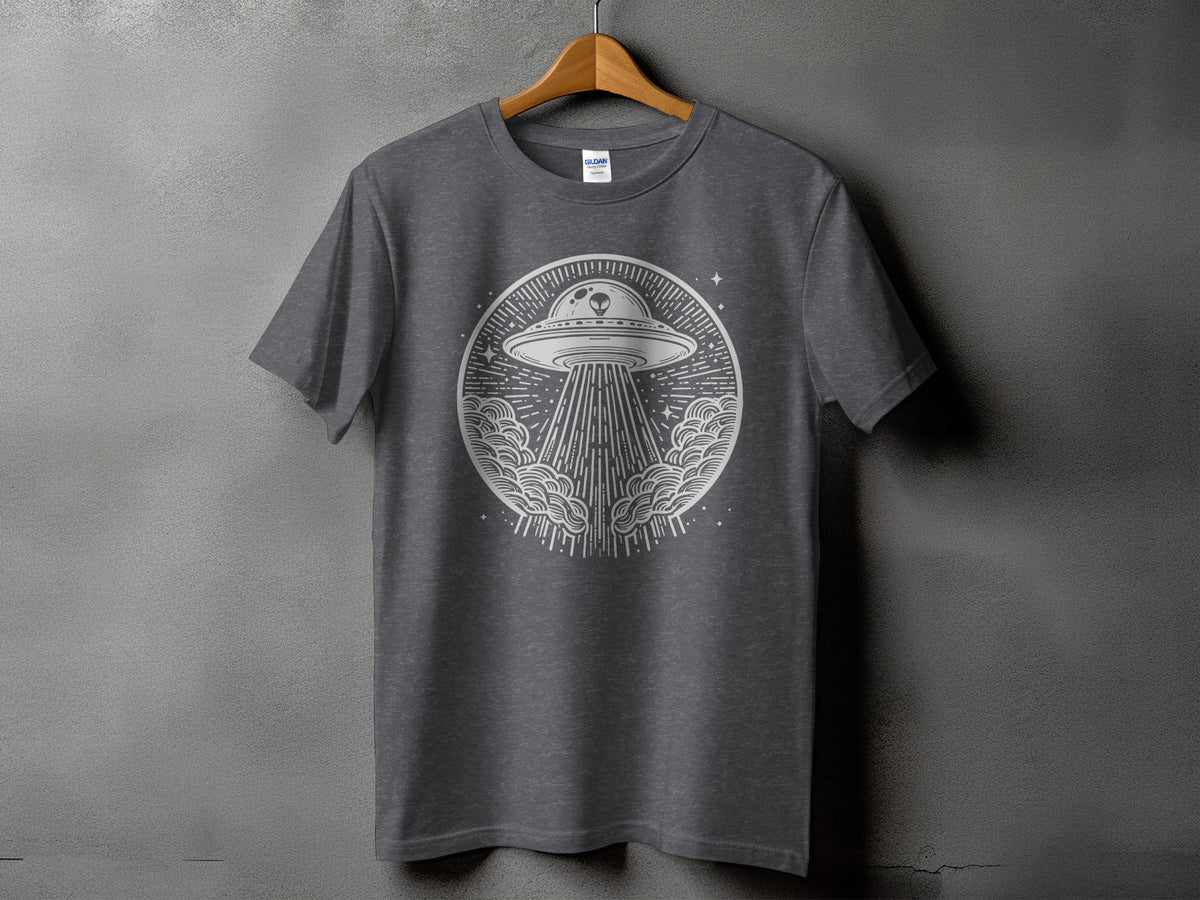 Gray t-shirt with circular alien spaceship and beam graphic design.