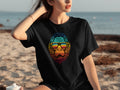 Black t-shirt with a colorful Bigfoot graphic wearing retro sunglasses.