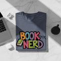 T-shirt with colorful "BOOK NERD" graphic, book, and glasses.