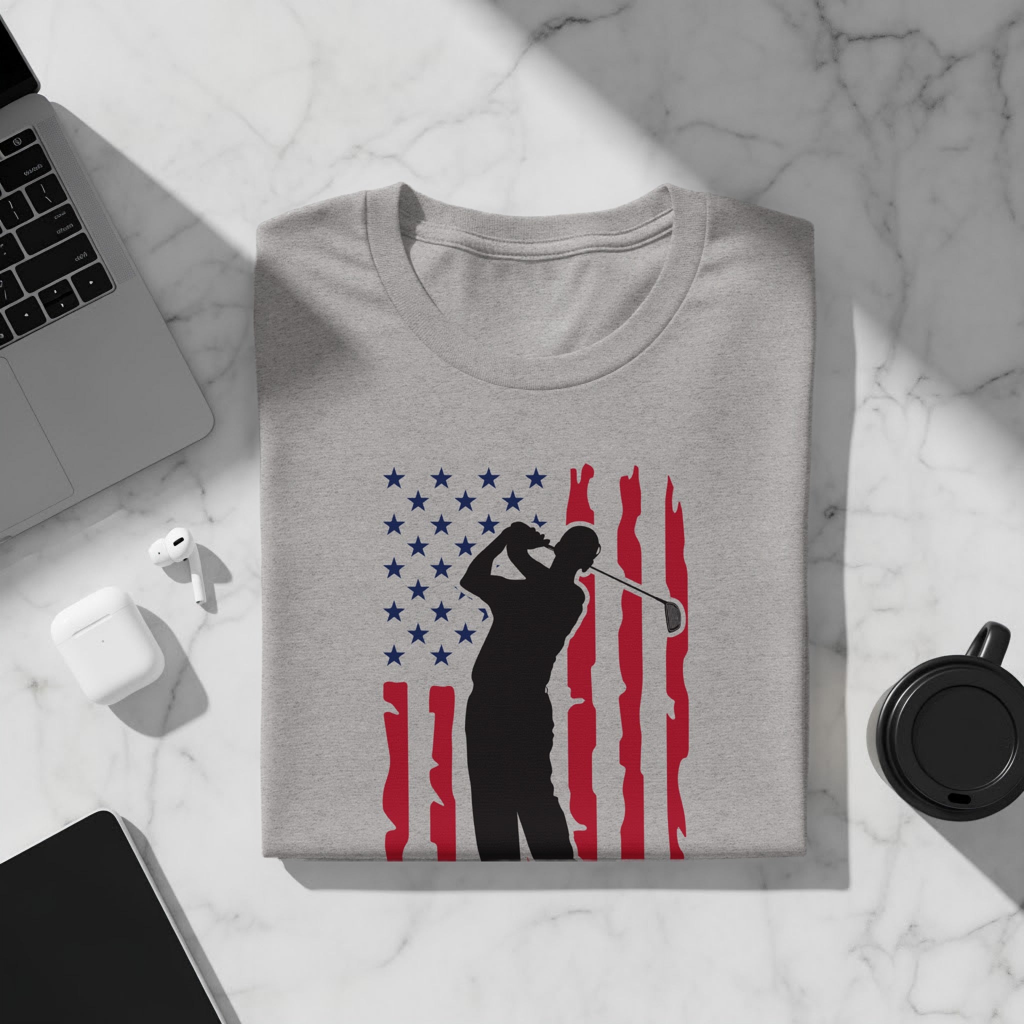 Gray t-shirt with golfer silhouette against distressed American flag design.