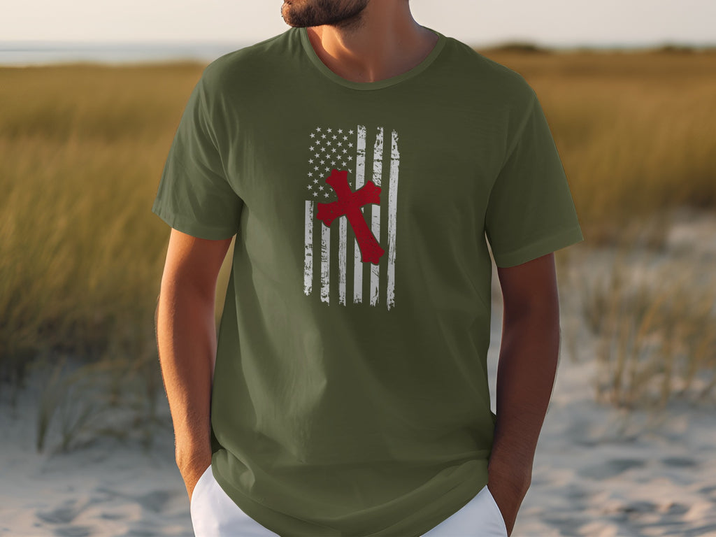 Green t-shirt with distressed American flag and red cross graphic.