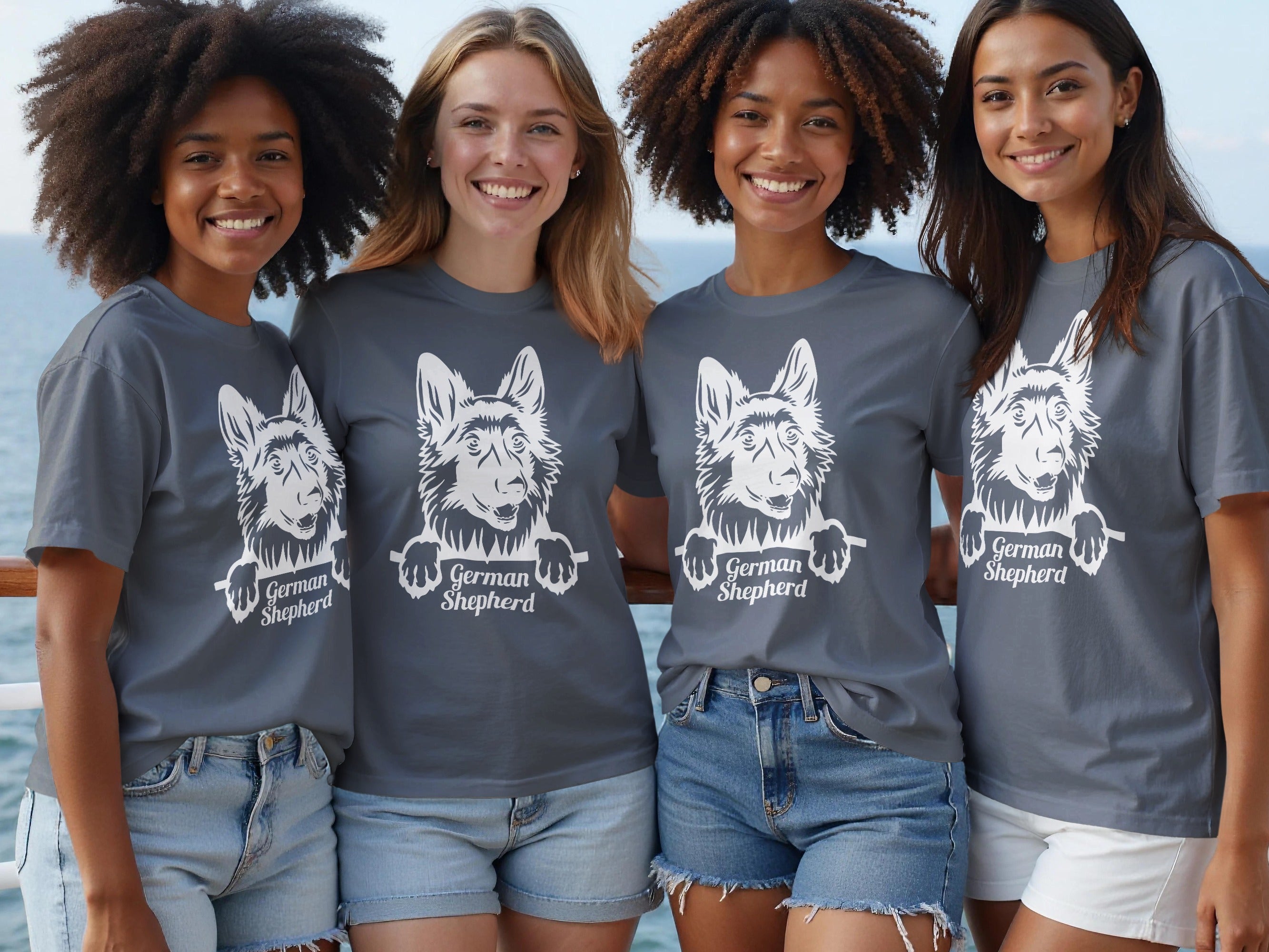 Four women in gray t-shirts with German Shepherd graphic and text.