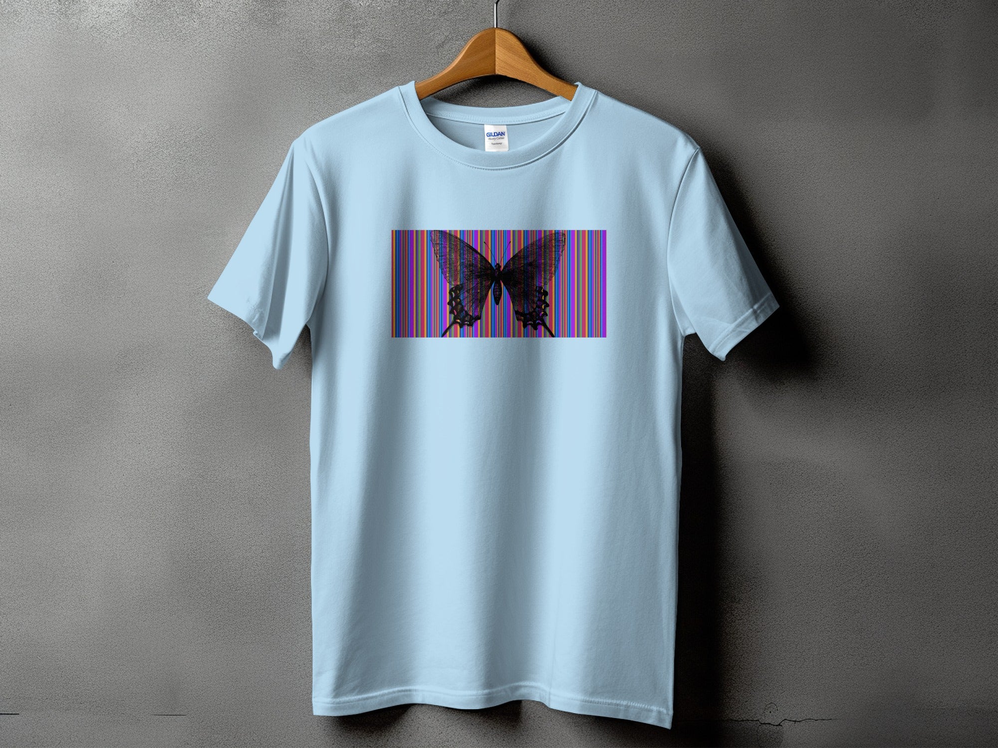 Light blue t-shirt with a black butterfly graphic on a striped background.