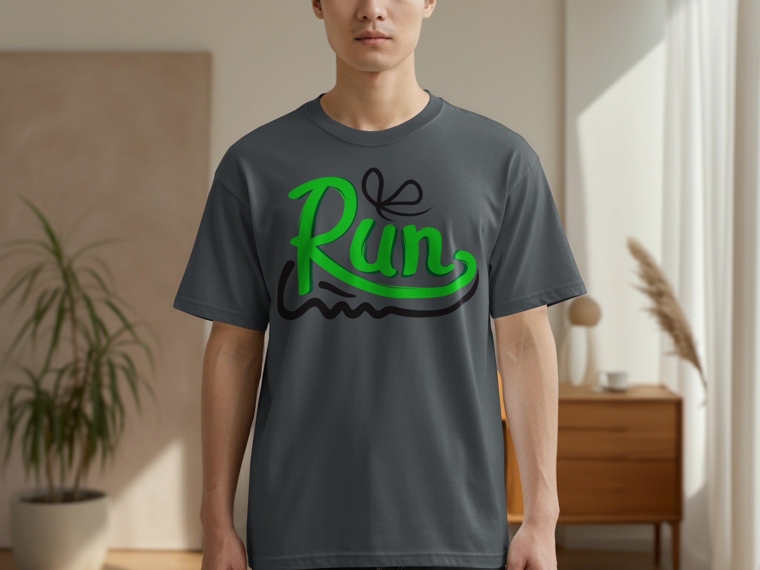 Gray t-shirt with green and black "Run" graphic on chest.