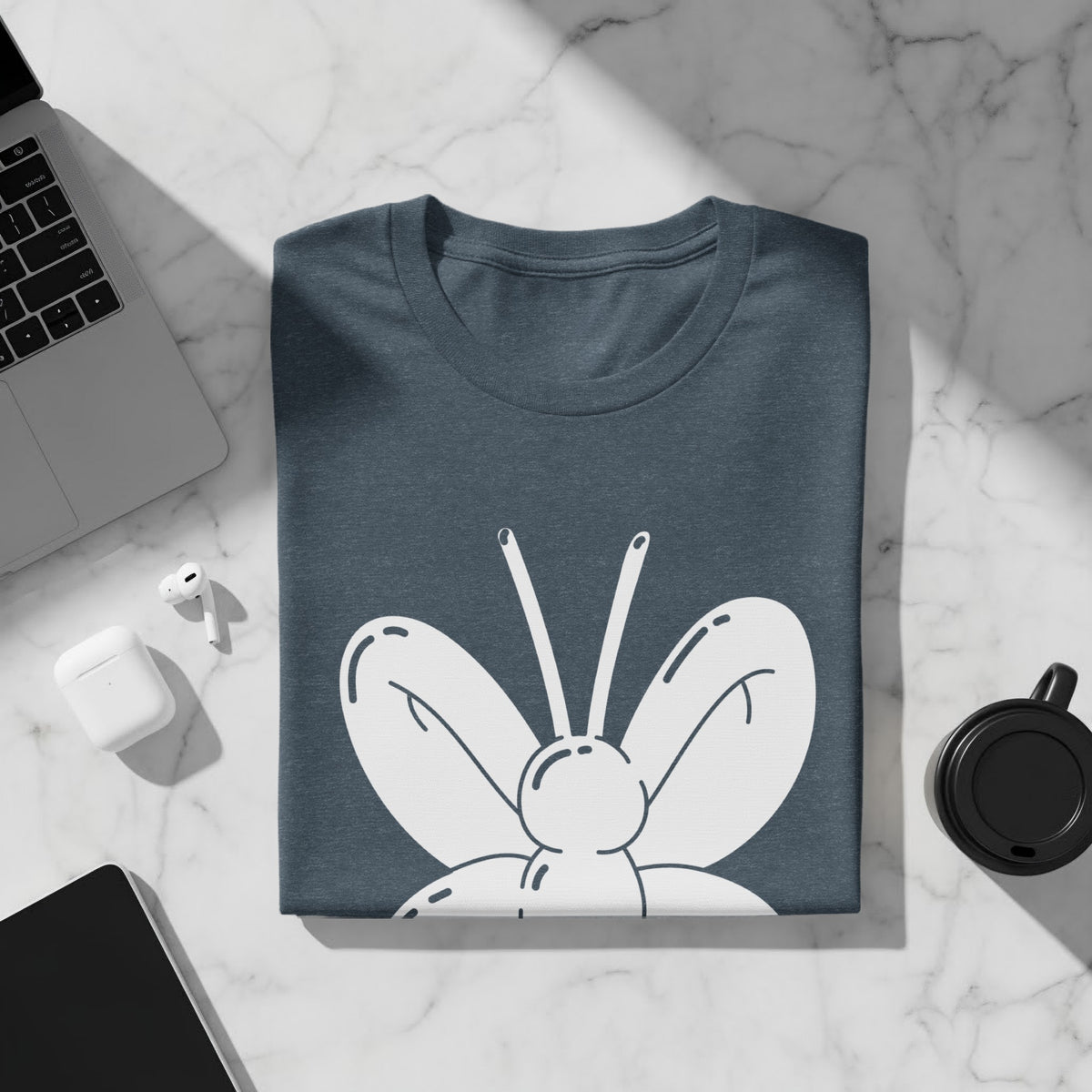 Dark blue t-shirt with a white butterfly graphic on the front.
