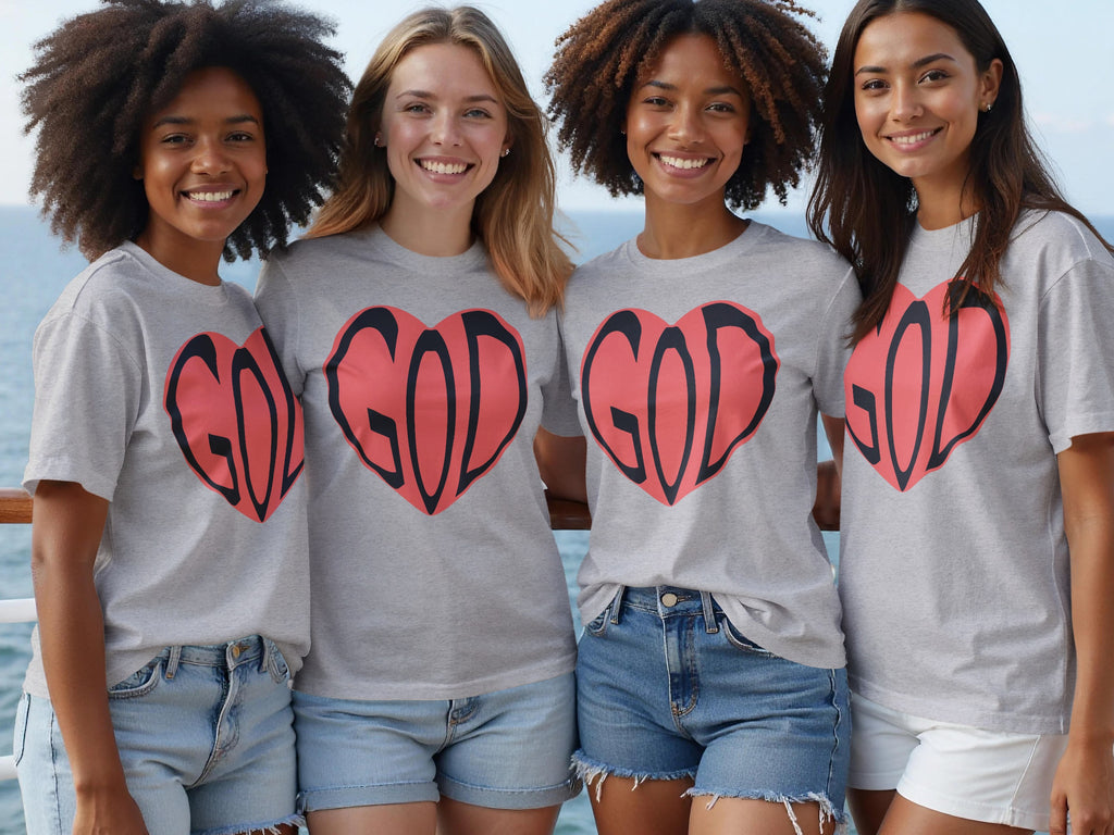 Four women in grey t-shirts with "GOD" in a red heart design stand together.