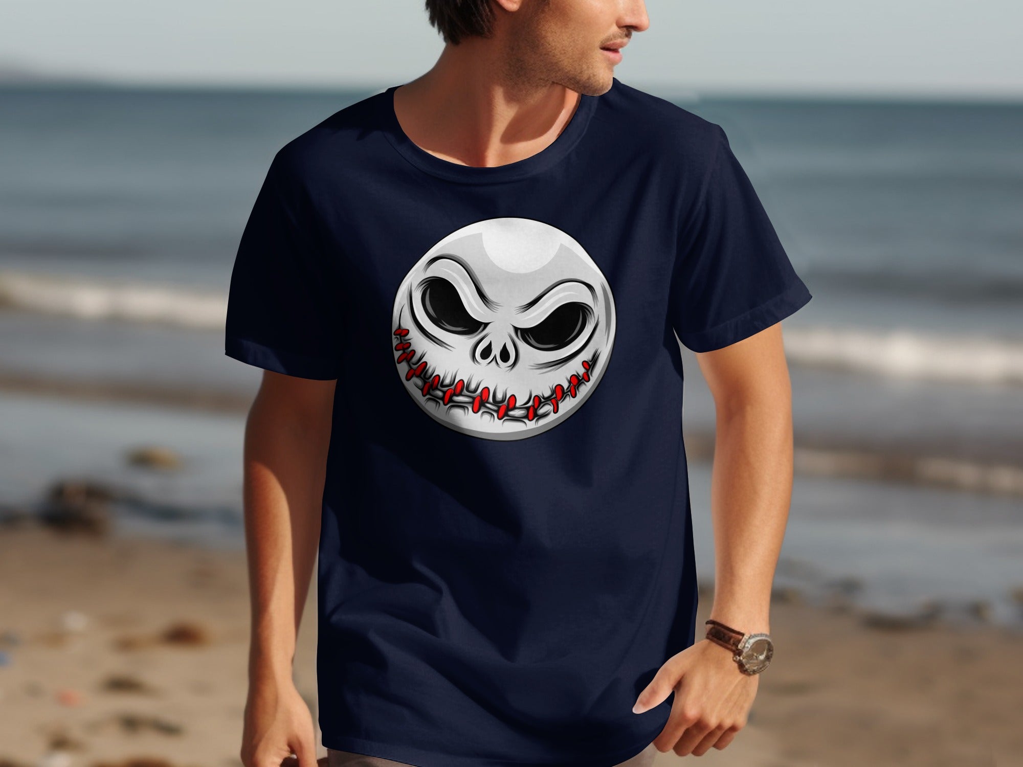 Navy t-shirt with a stitched skull face graphic on the chest.