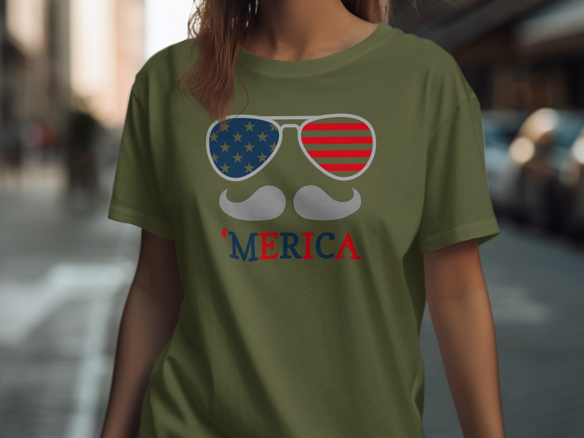 Green t-shirt with sunglasses featuring American flag design and the word 'MERICA.