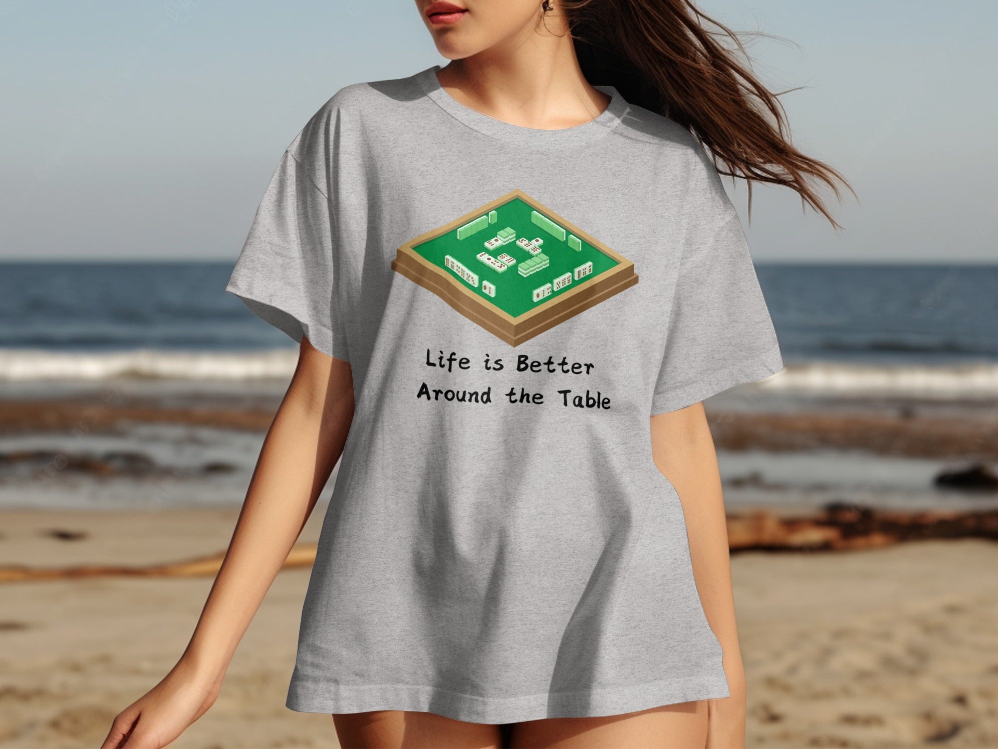 Gray t-shirt with mahjong game illustration and text "Life is Better Around the Table".