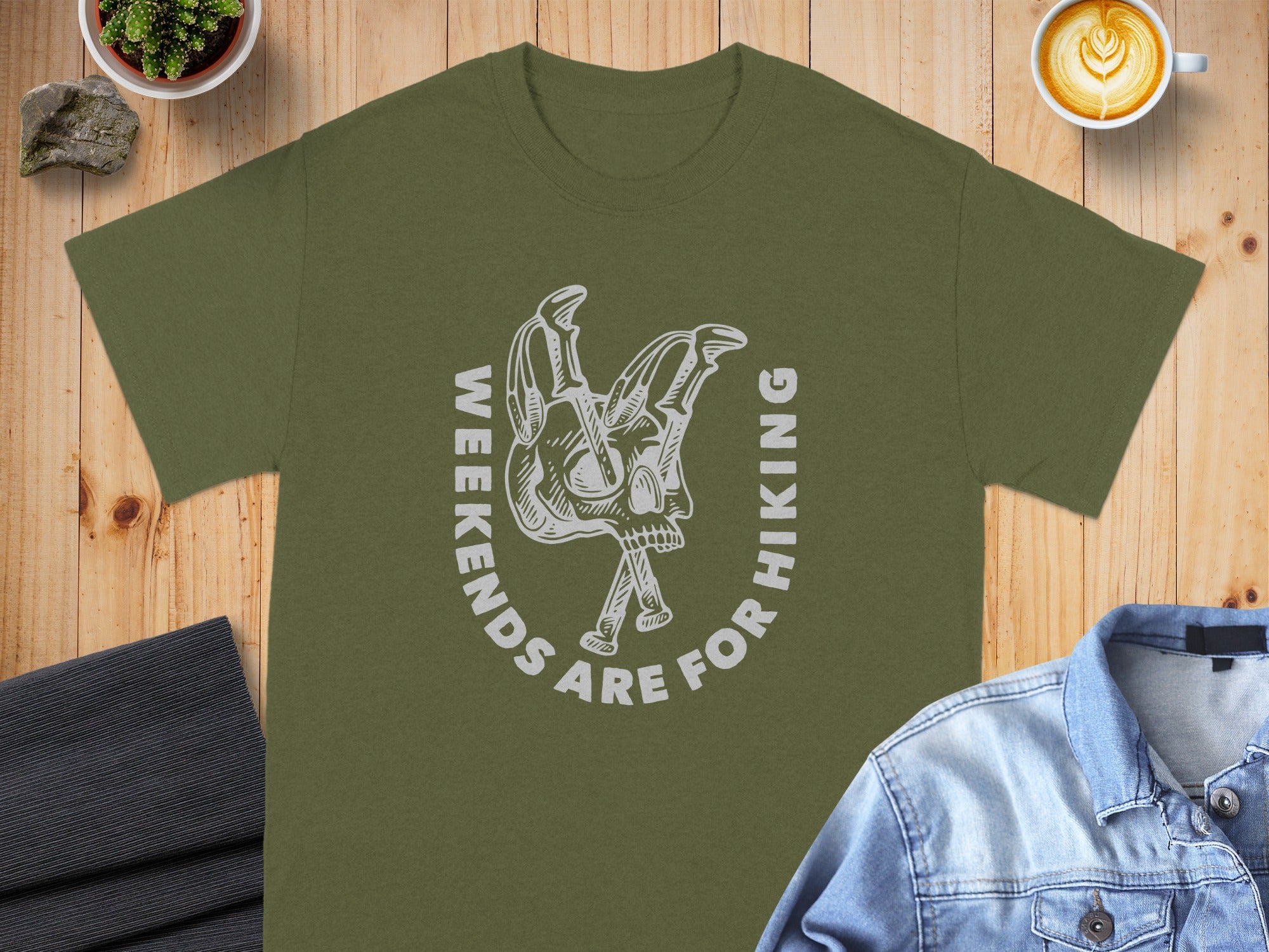 Olive t-shirt with "Weekends Are For Hiking" text and skull graphic.
