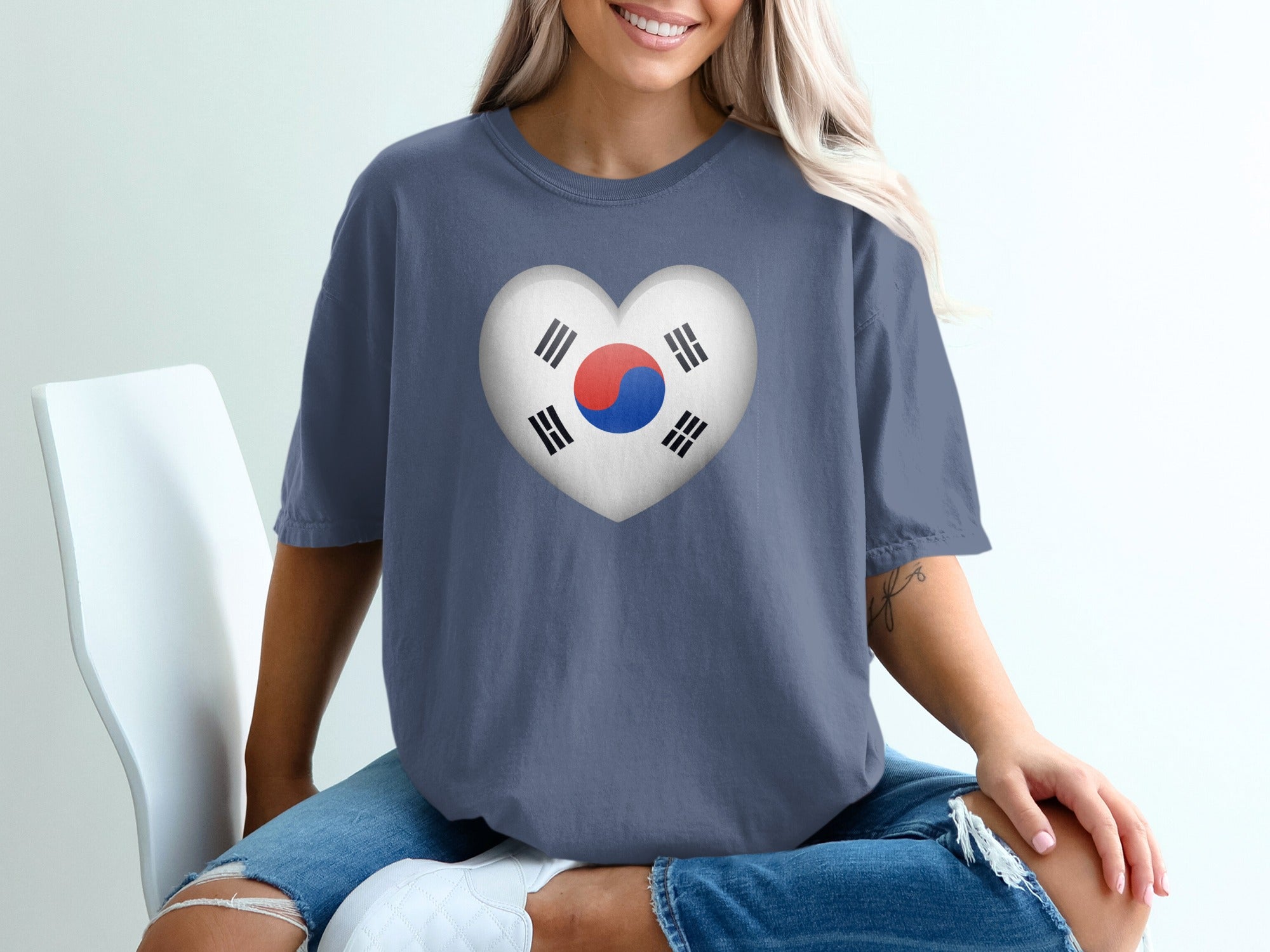 T-shirt with a heart-shaped South Korean flag graphic.