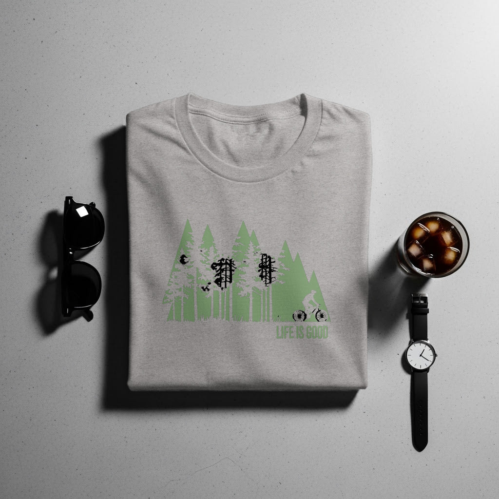 Grey t-shirt with a green forest and bicyclist graphic that says "LIFE IS GOOD."