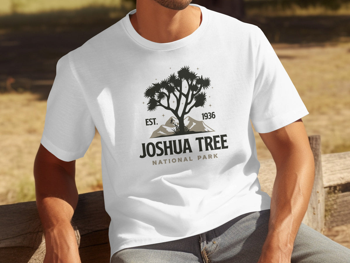 White t-shirt with Joshua Tree National Park logo featuring a tree and mountains.