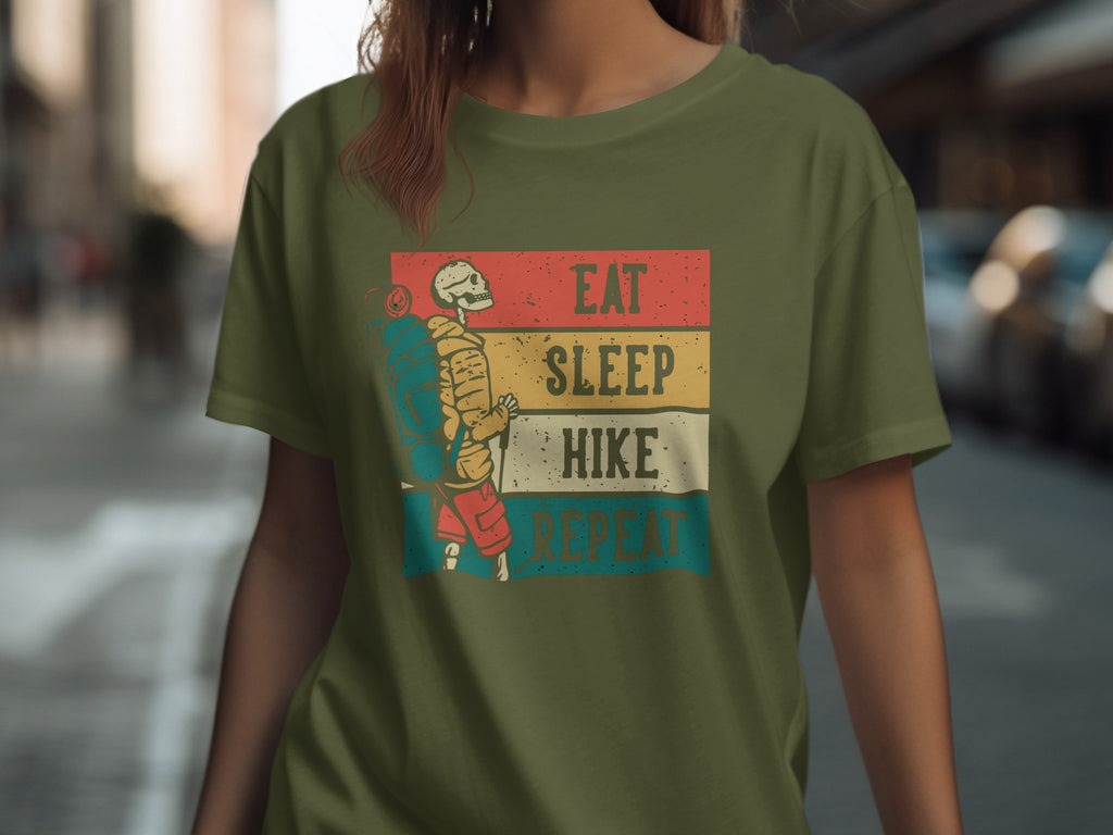 Green t-shirt with skeleton hiker graphic and text "Eat Sleep Hike Repeat".