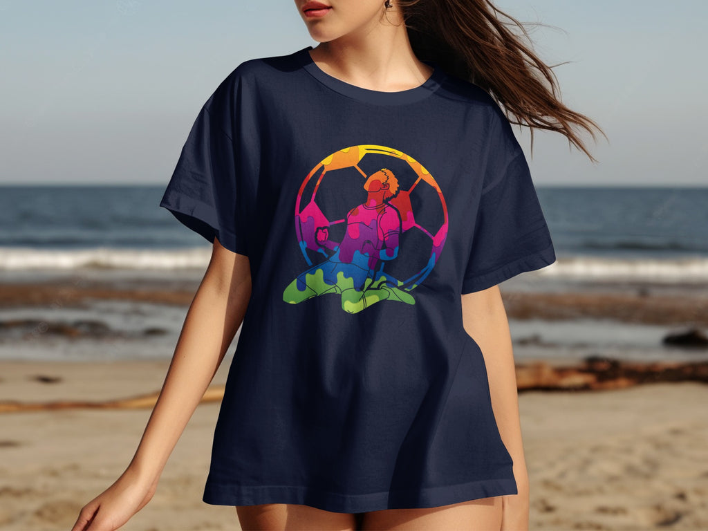 Navy t-shirt with multicolored illustrated soccer player inside a soccer ball.