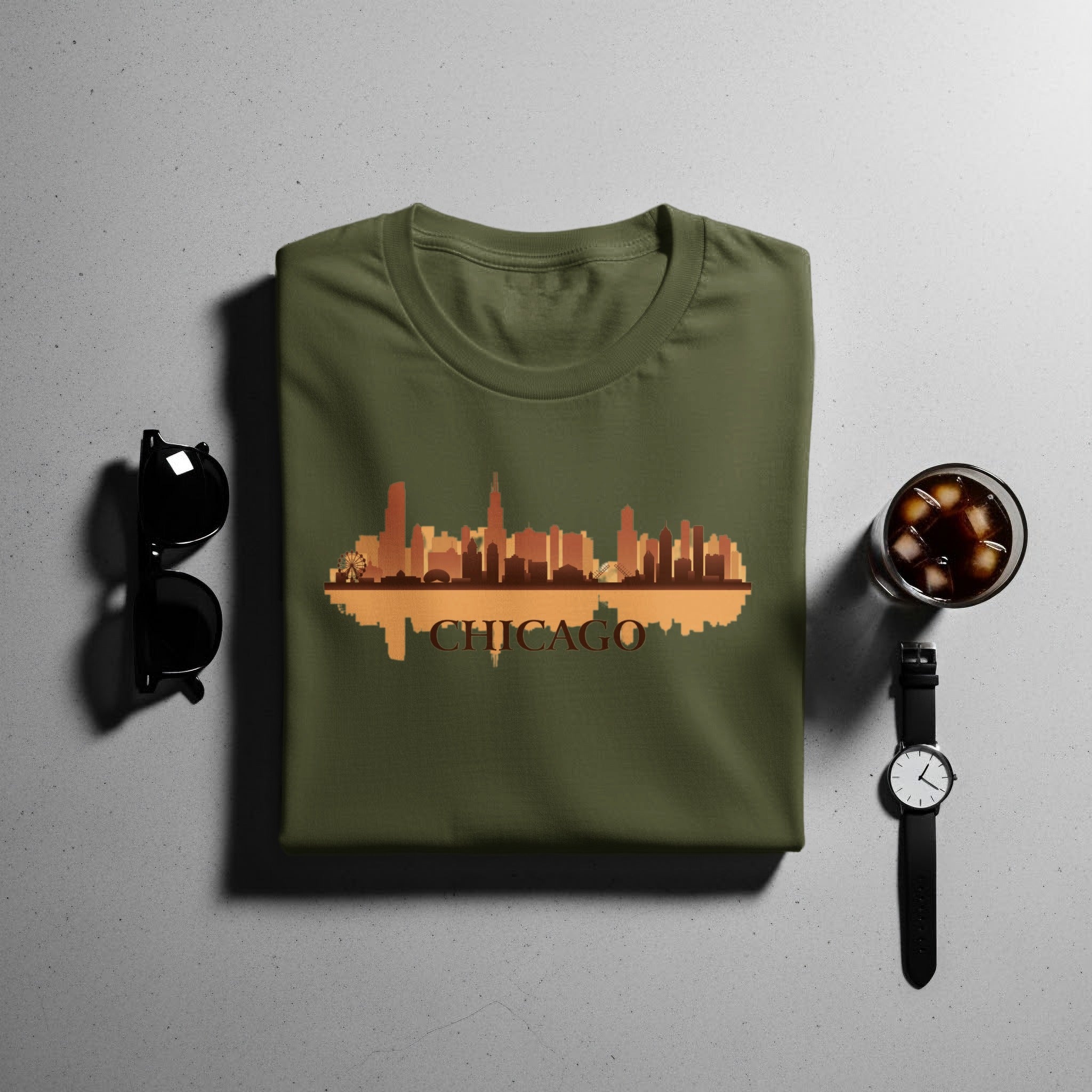 Green t-shirt with Chicago skyline graphic and text.
