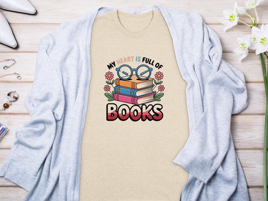 T-shirt graphic with stack of books and text "My heart is full of Books".