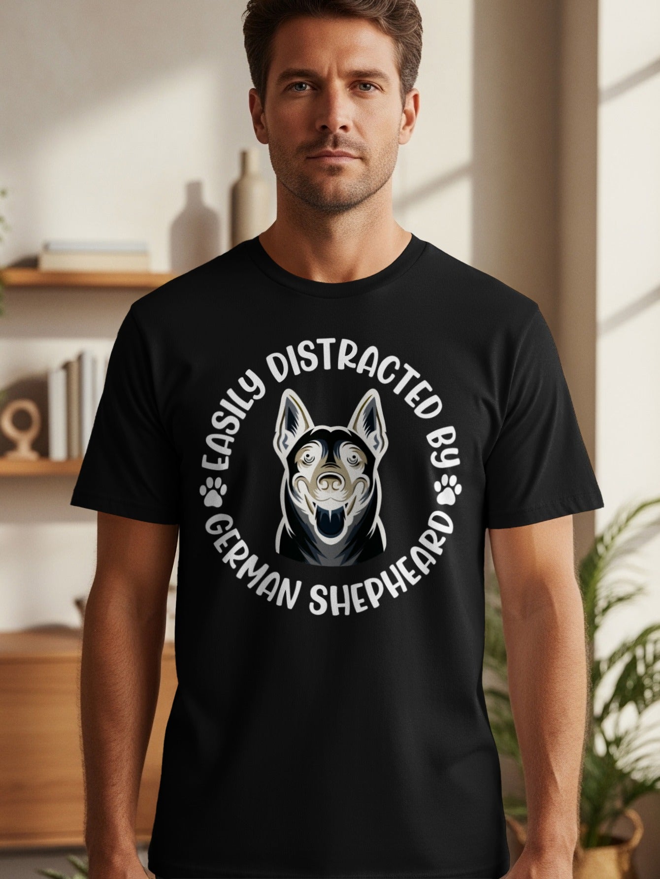 Black t-shirt featuring a German Shepherd head graphic with text "Easily Distracted By German Shepherd".