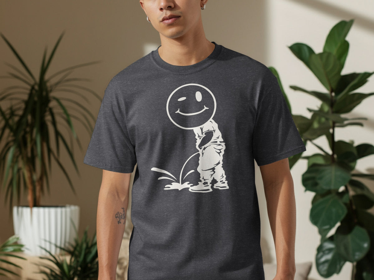 Dark gray t-shirt with a white graphic of a winking smiley face over a figure peeing.