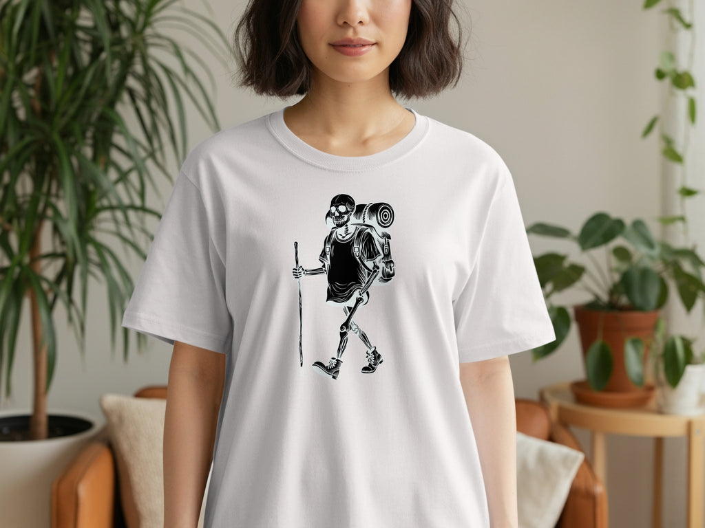 Black skeleton hiker with backpack and walking stick on white t-shirt.
