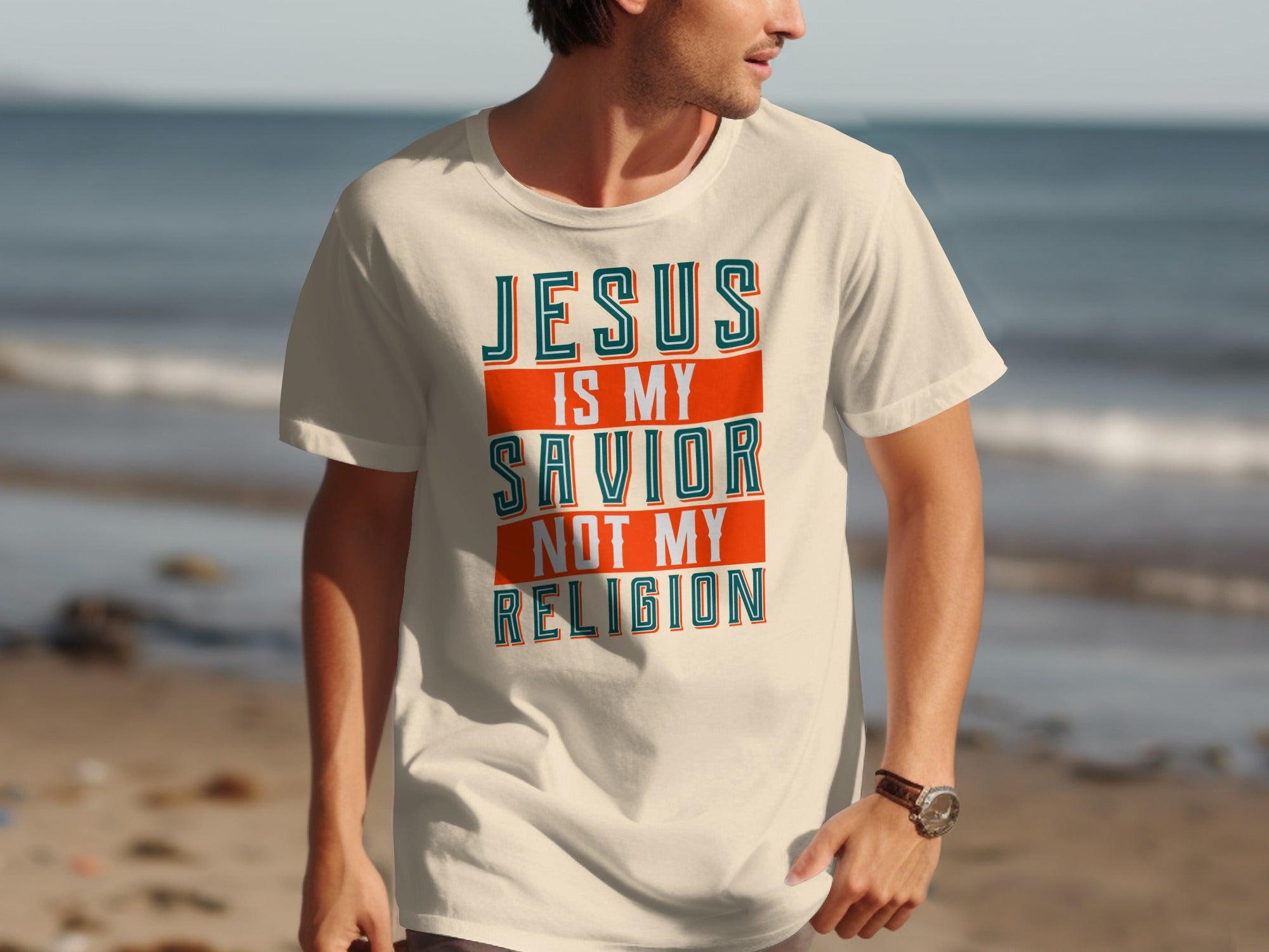 Cream t-shirt with "Jesus is my Savior not my Religion" text.