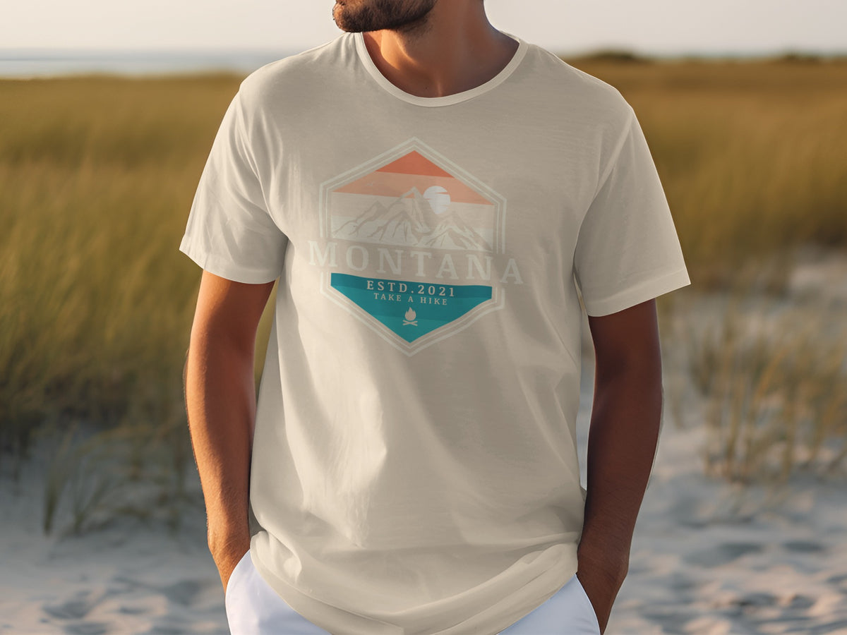 T-shirt with Montana Estd. 2021 Take a Hike graphic featuring mountains.