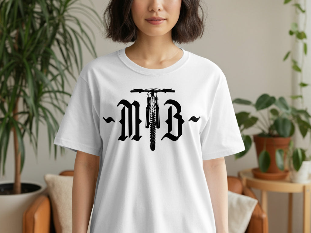 White t-shirt with black MTB logo featuring a bicycle and gothic lettering.