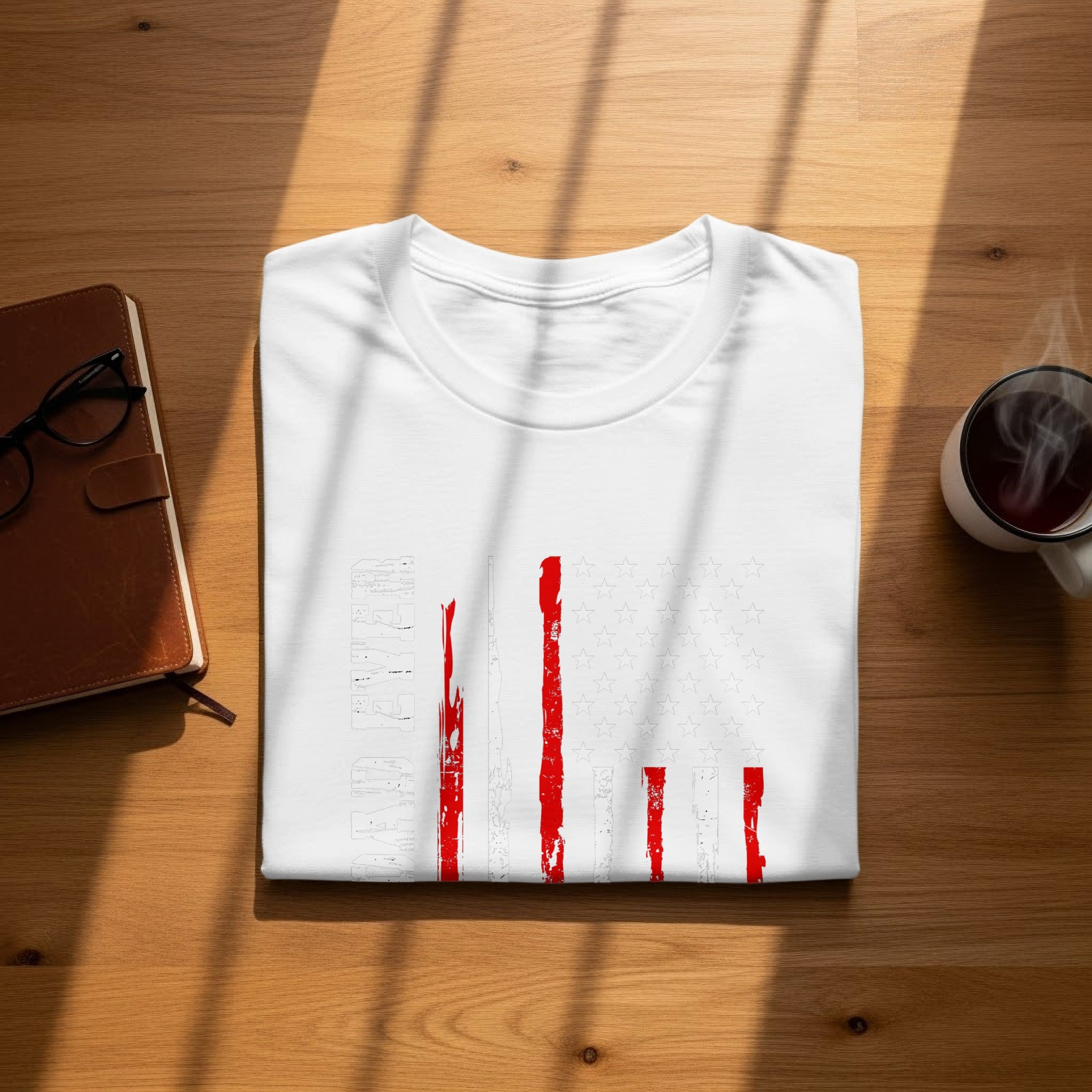 White t-shirt with distressed American flag design and text.