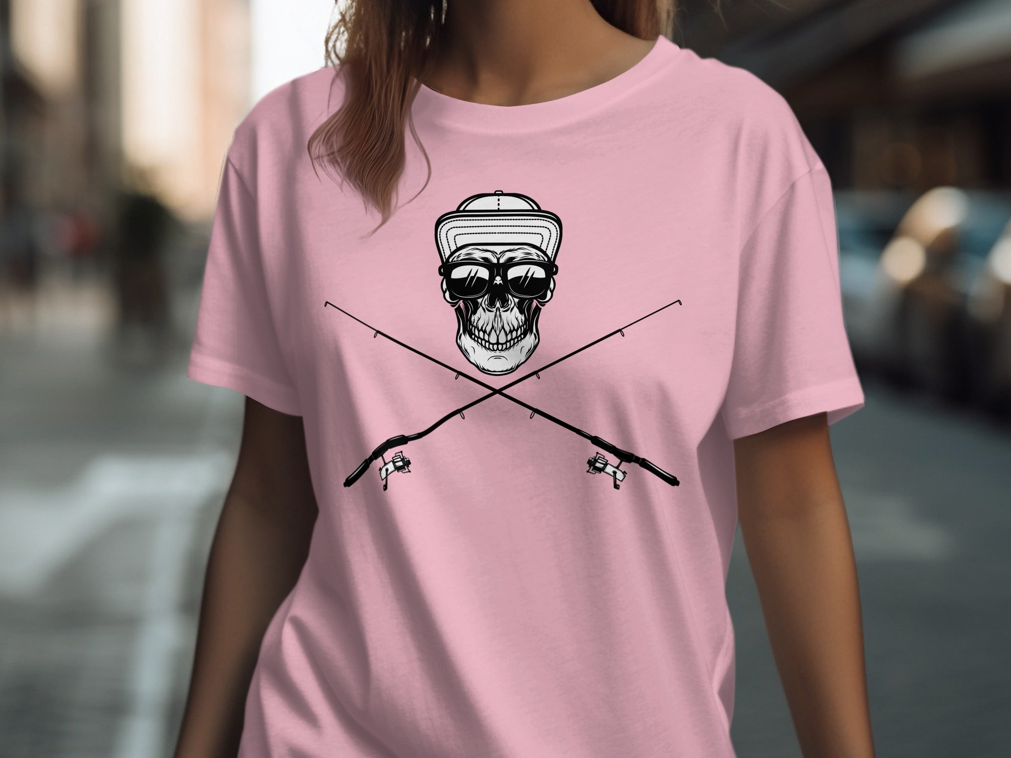 Pink t-shirt with crossed fishing rods and a skull wearing sunglasses and a hat.