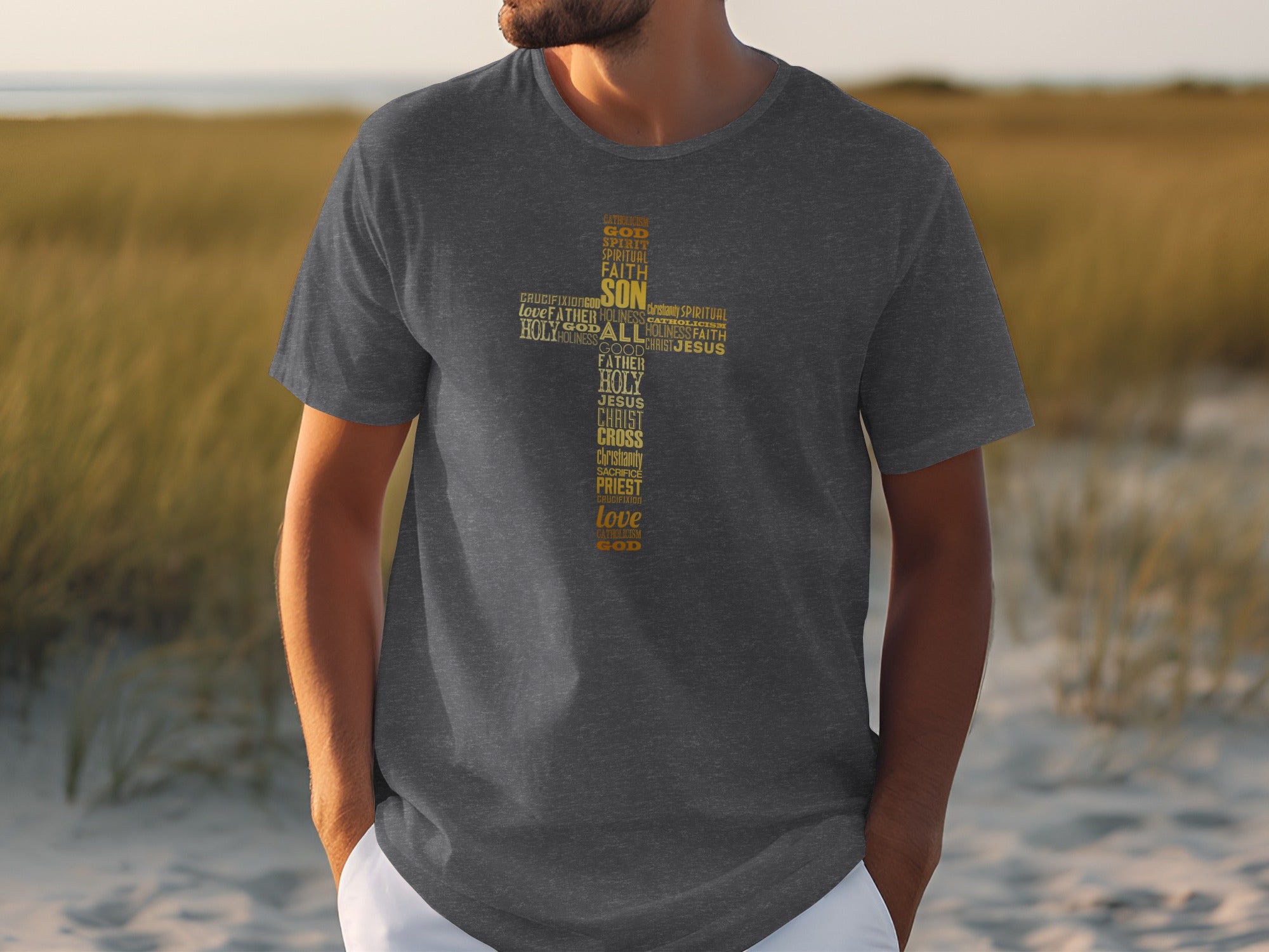 Dark gray t-shirt with a yellow word cloud forming a cross with religious terms.