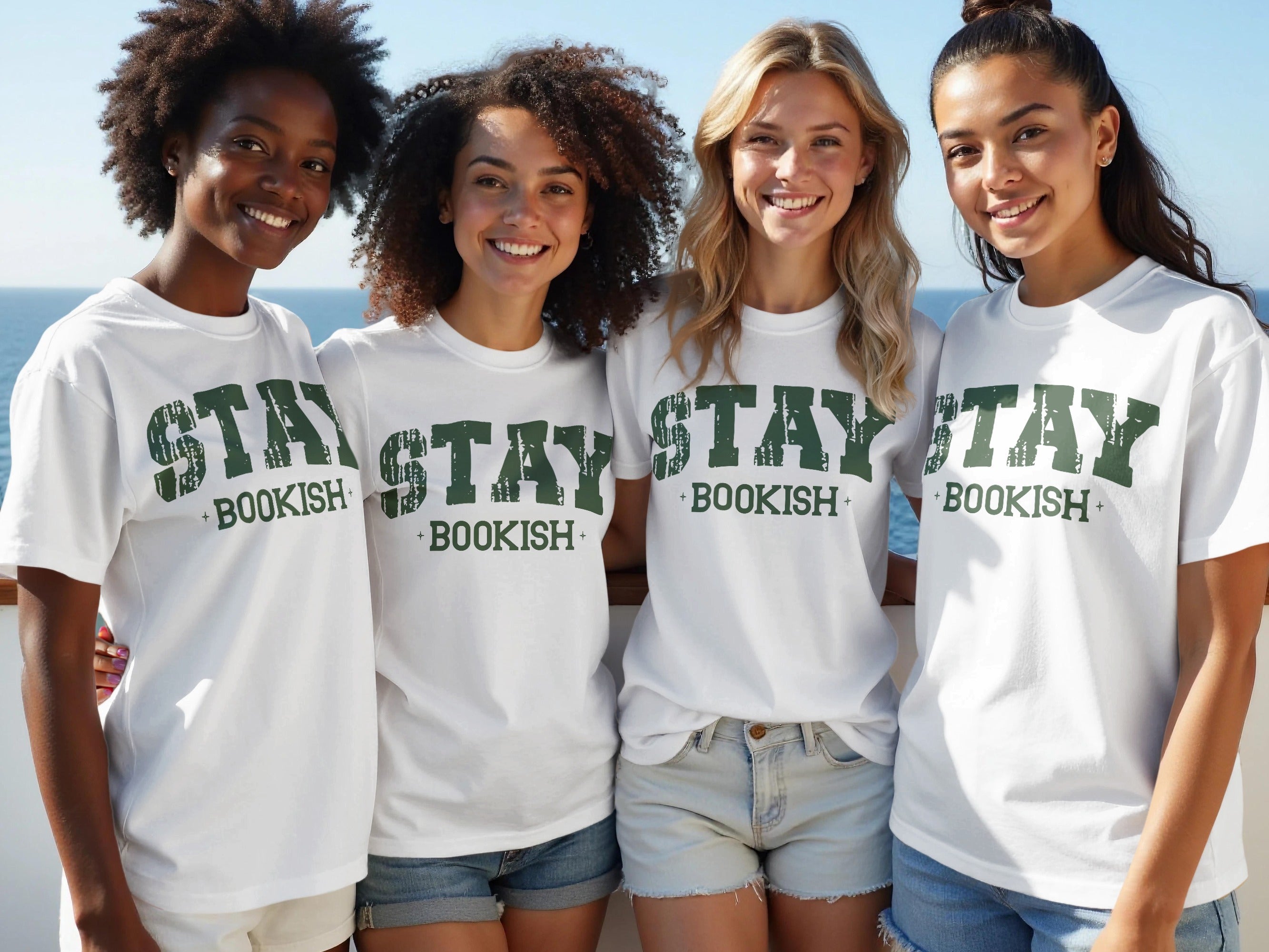 Four women wear white t-shirts printed with green "STAY BOOKISH" text.