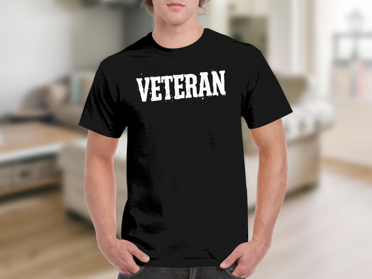 Black t-shirt with white distressed "VETERAN" text across chest.