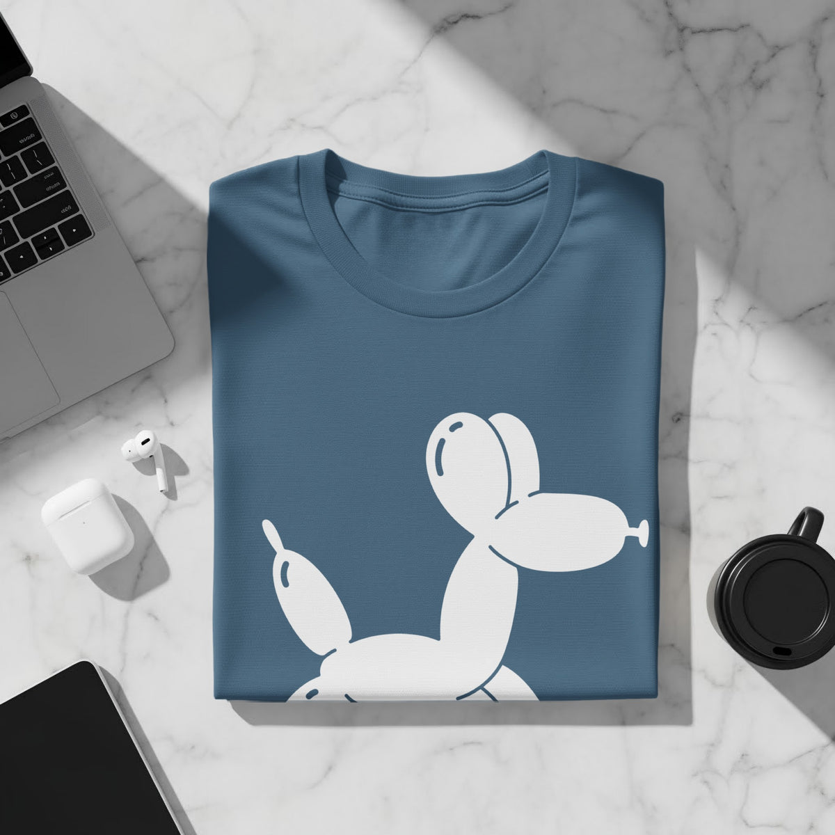 Blue t-shirt with a white balloon dog graphic on the front.