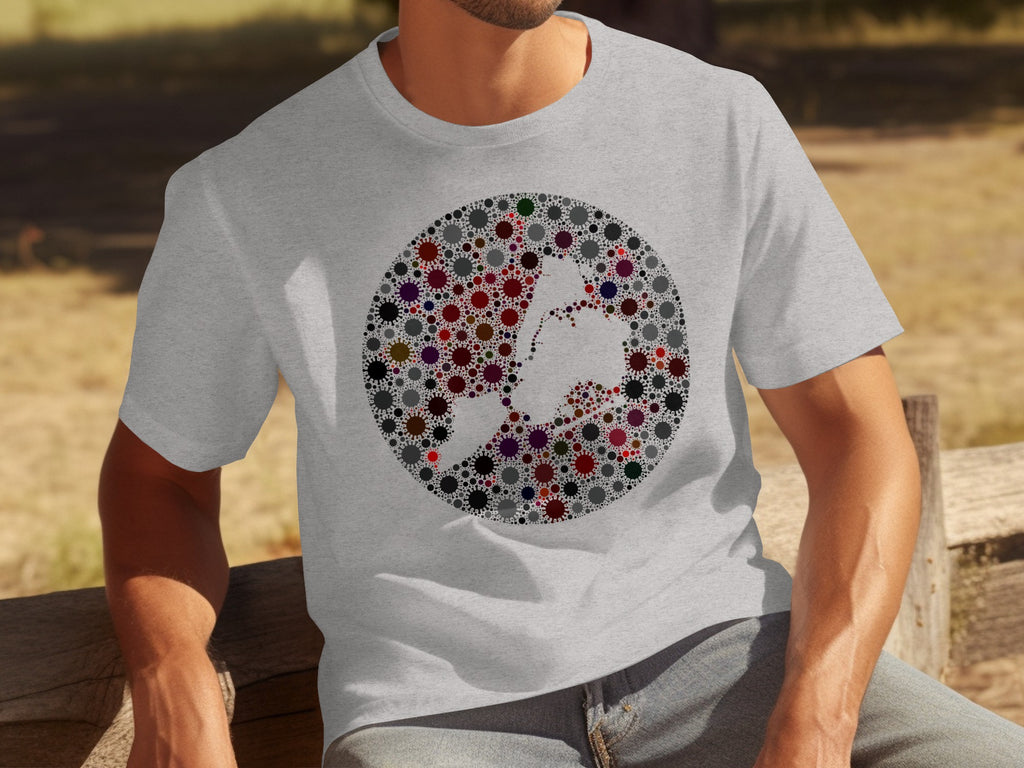 Gray t-shirt with a circular pixelated image of a heart made of virus-like shapes.
