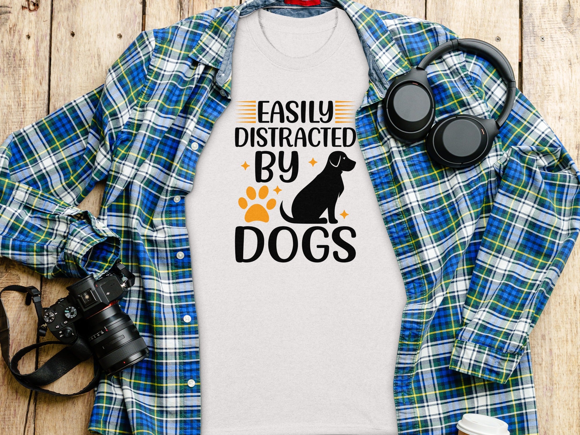 White t-shirt with "Easily Distracted By Dogs" text and dog graphic.