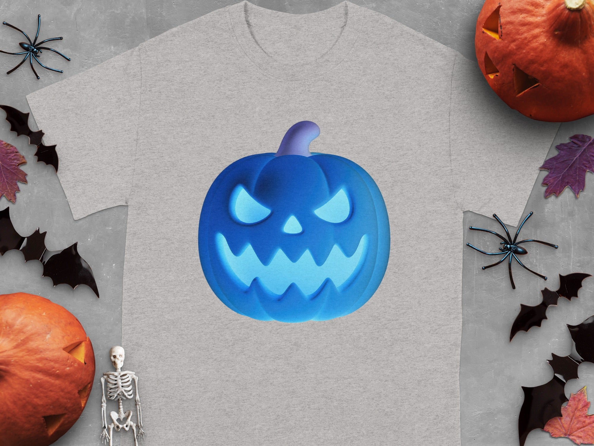 A blue, glowing jack-o'-lantern design on a gray t-shirt.