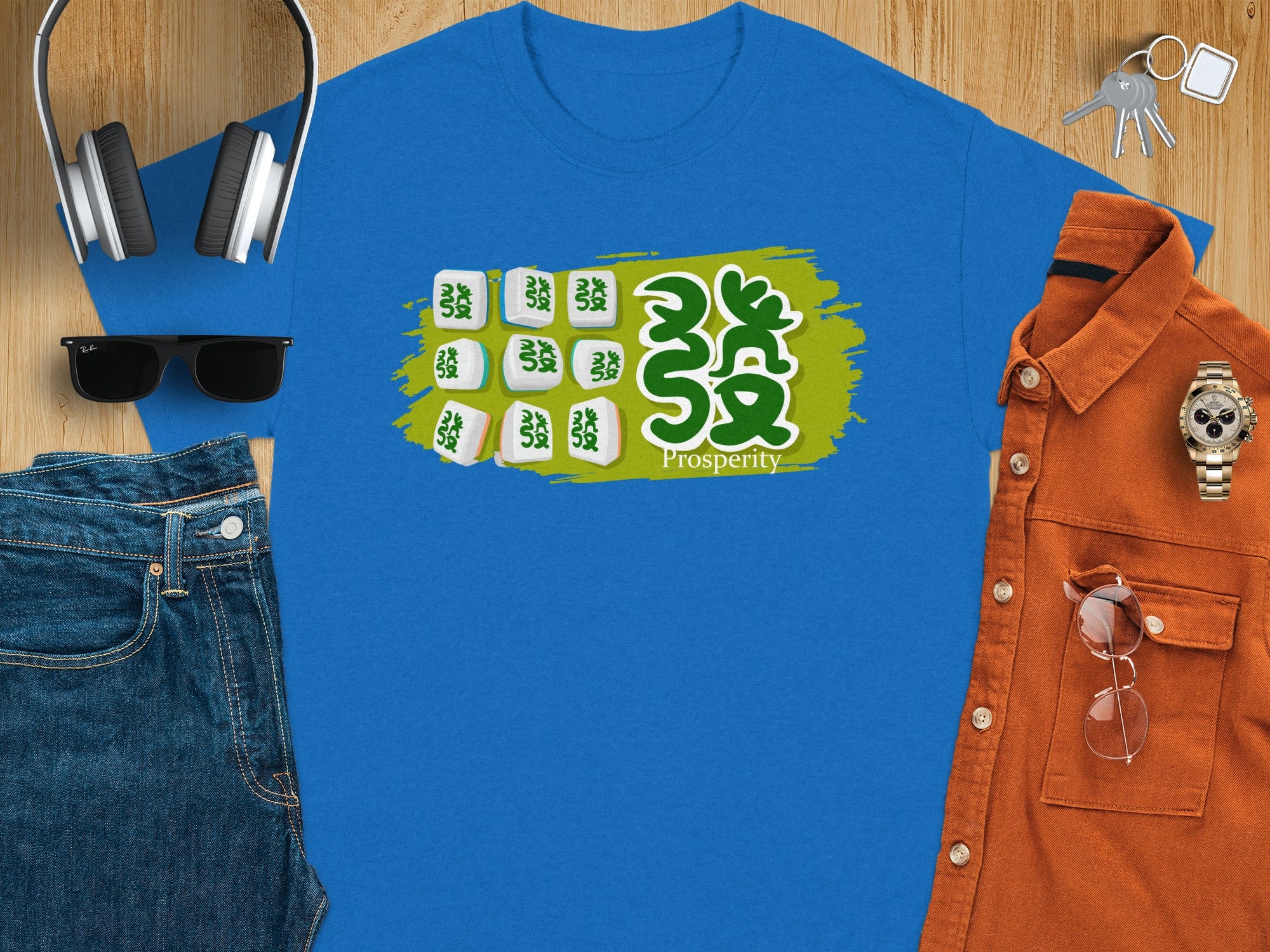Blue t-shirt with Chinese characters and the word "Prosperity."