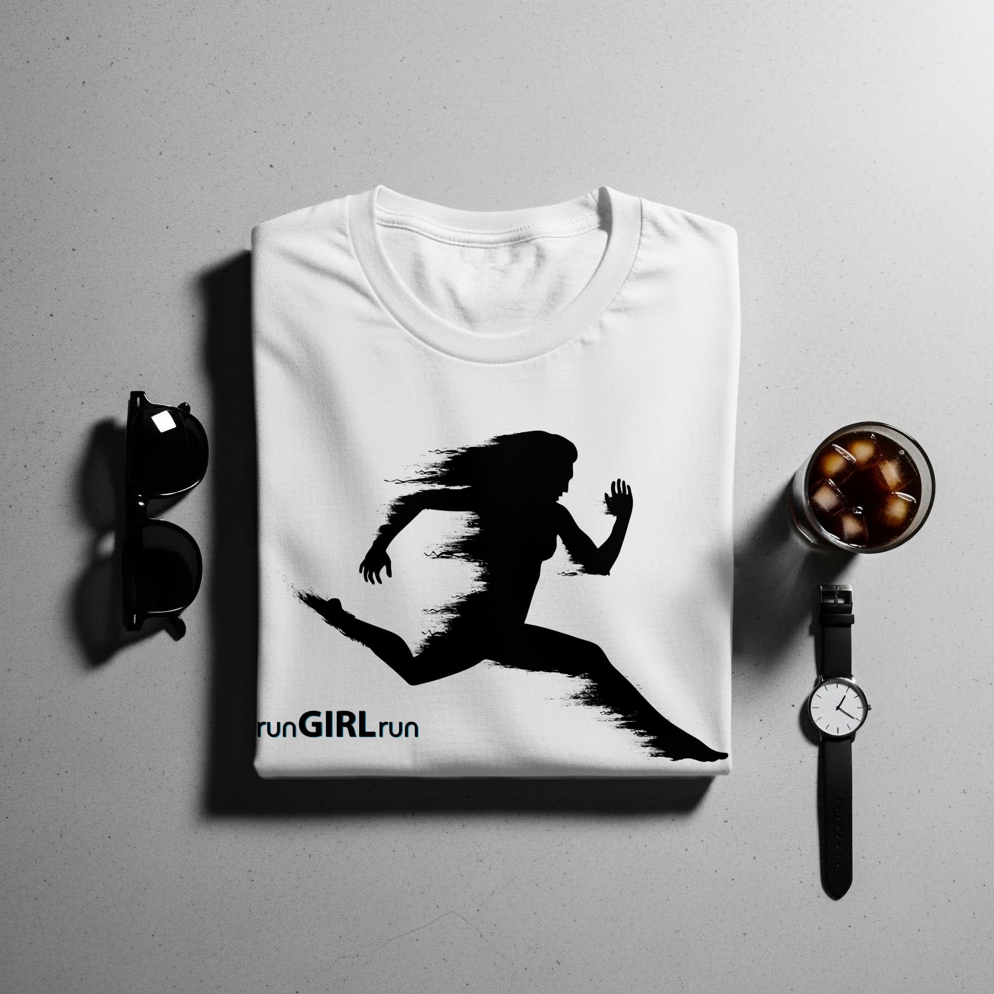 White t-shirt with black silhouette of a running woman and "runGIRLrun" text.