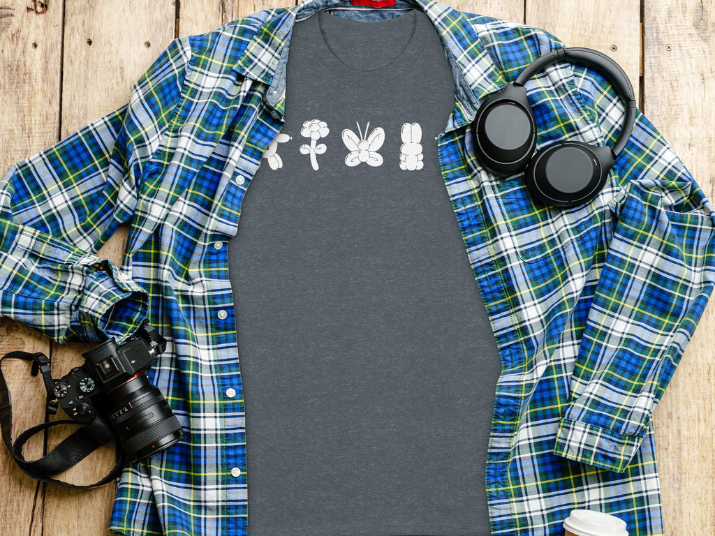 Gray t-shirt with white balloon animals: dog, flower, butterfly, and rabbit.