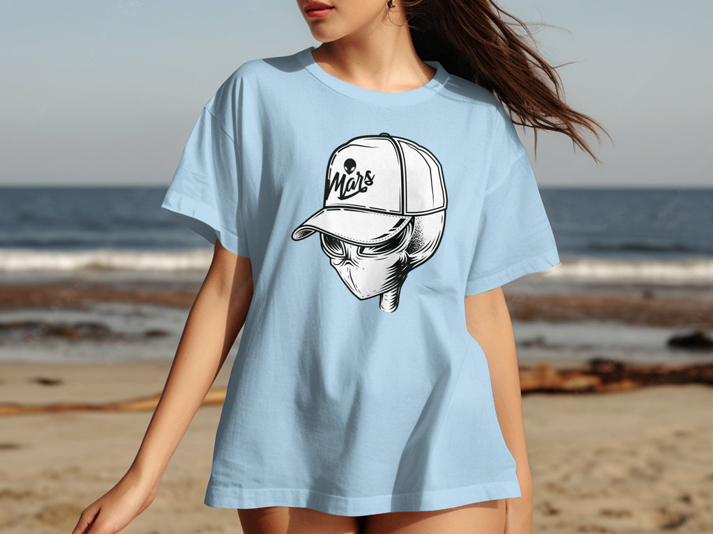 Light blue t-shirt with graphic of alien wearing cap and sunglasses labeled "Mars".