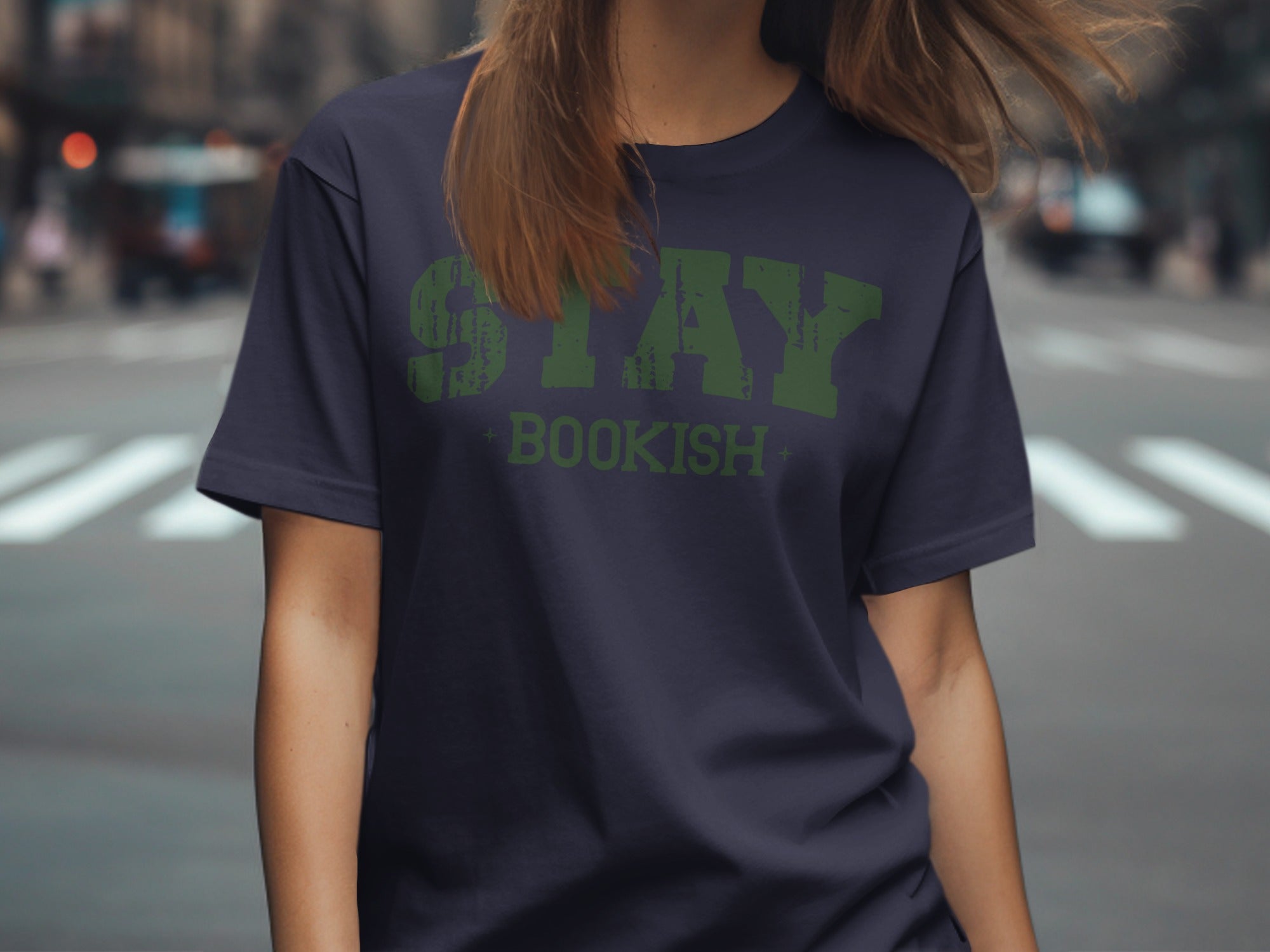 Navy t-shirt with green distressed text that reads "STAY BOOKISH."