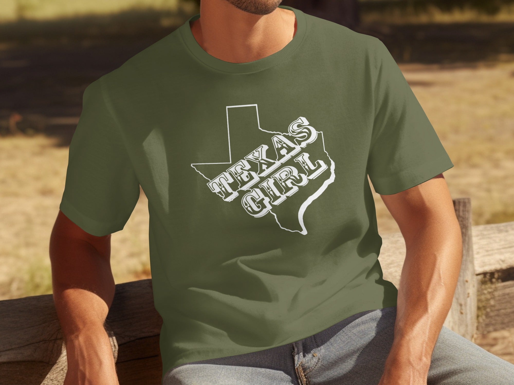 Green t-shirt with white outline of Texas and text "TEXAS GIRL".