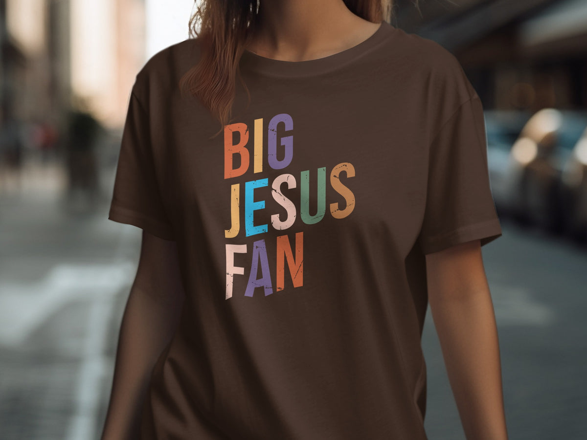 Brown t-shirt with colorful "BIG JESUS FAN" text.
